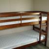 Bedroom 3 contains a bunk bed set.